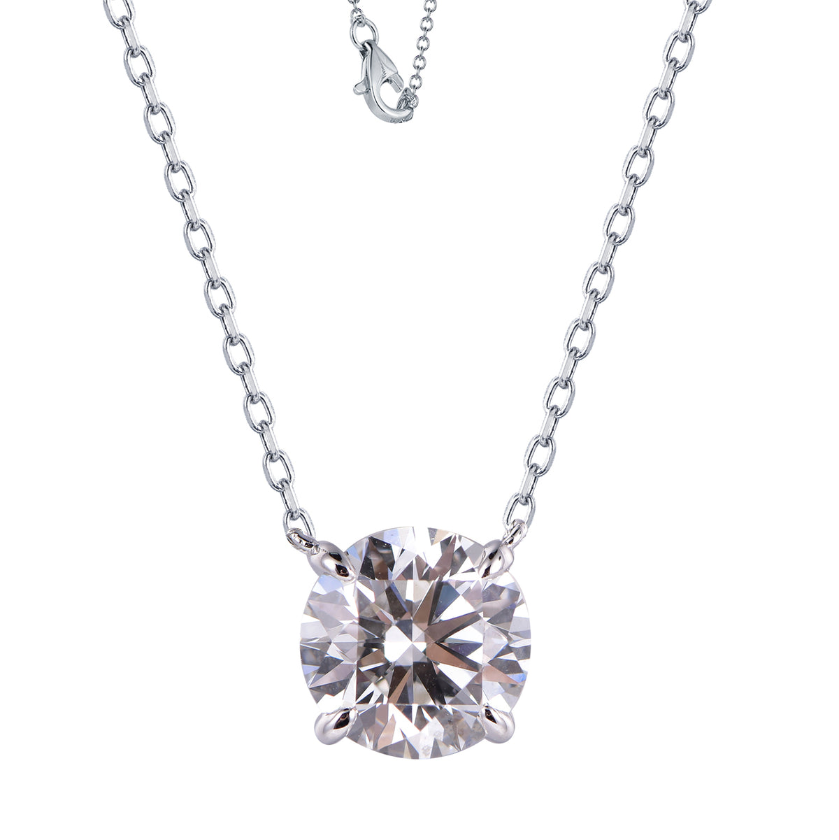 A white gold chain necklace with a round-cut clear diamond pendant in a four-prong setting, shown on a plain white background.