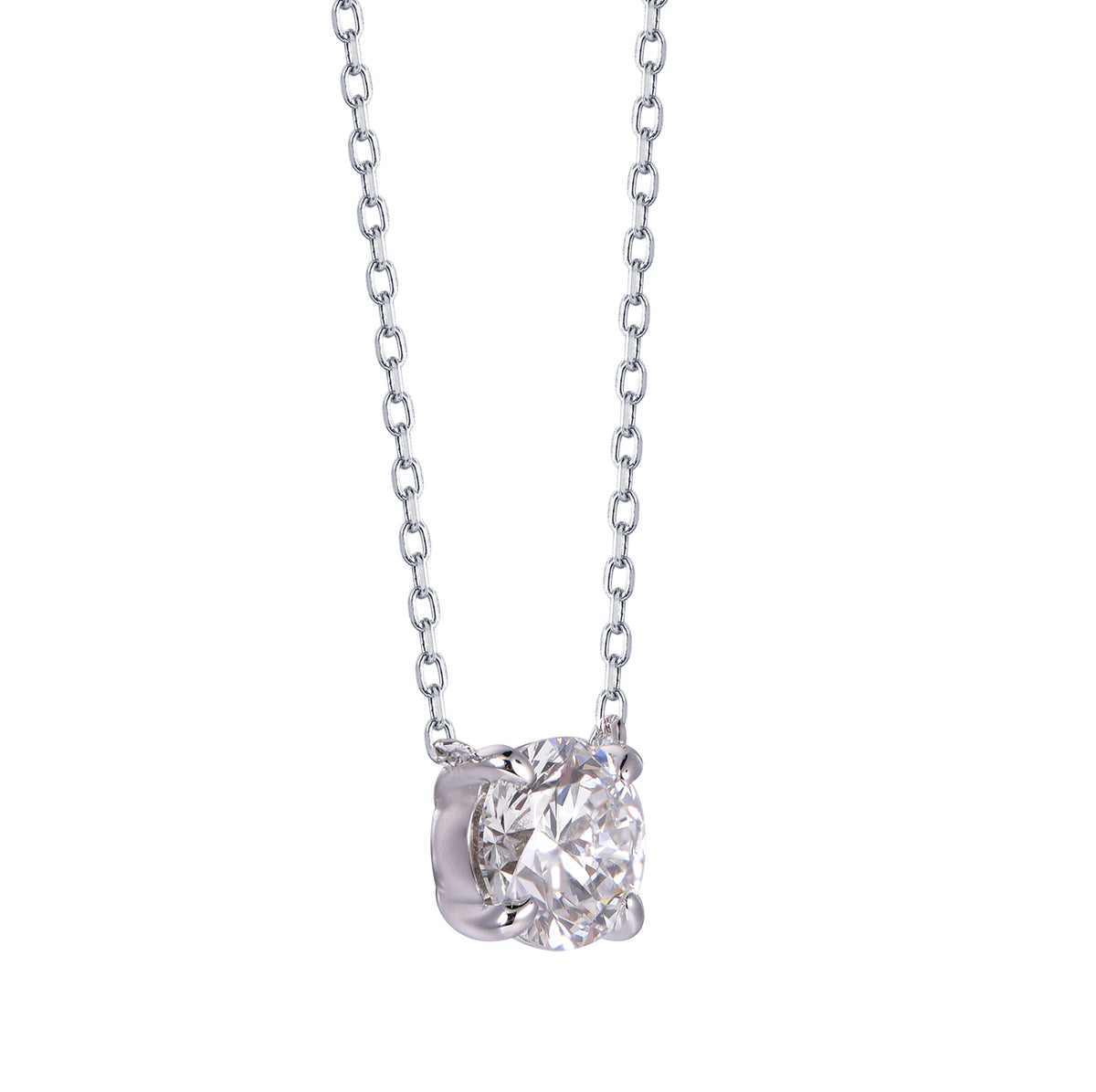 A classic solitaire diamond necklace featuring a round brilliant-cut diamond pendant in a silver four-prong setting on a delicate white gold chain, isolated on a white background.